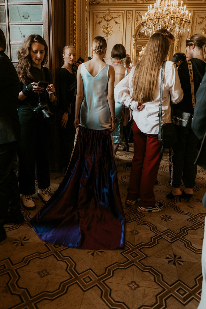 Multi colored dress with a train design and created by No Punching Bag at Flying solo Paris Fashion Week