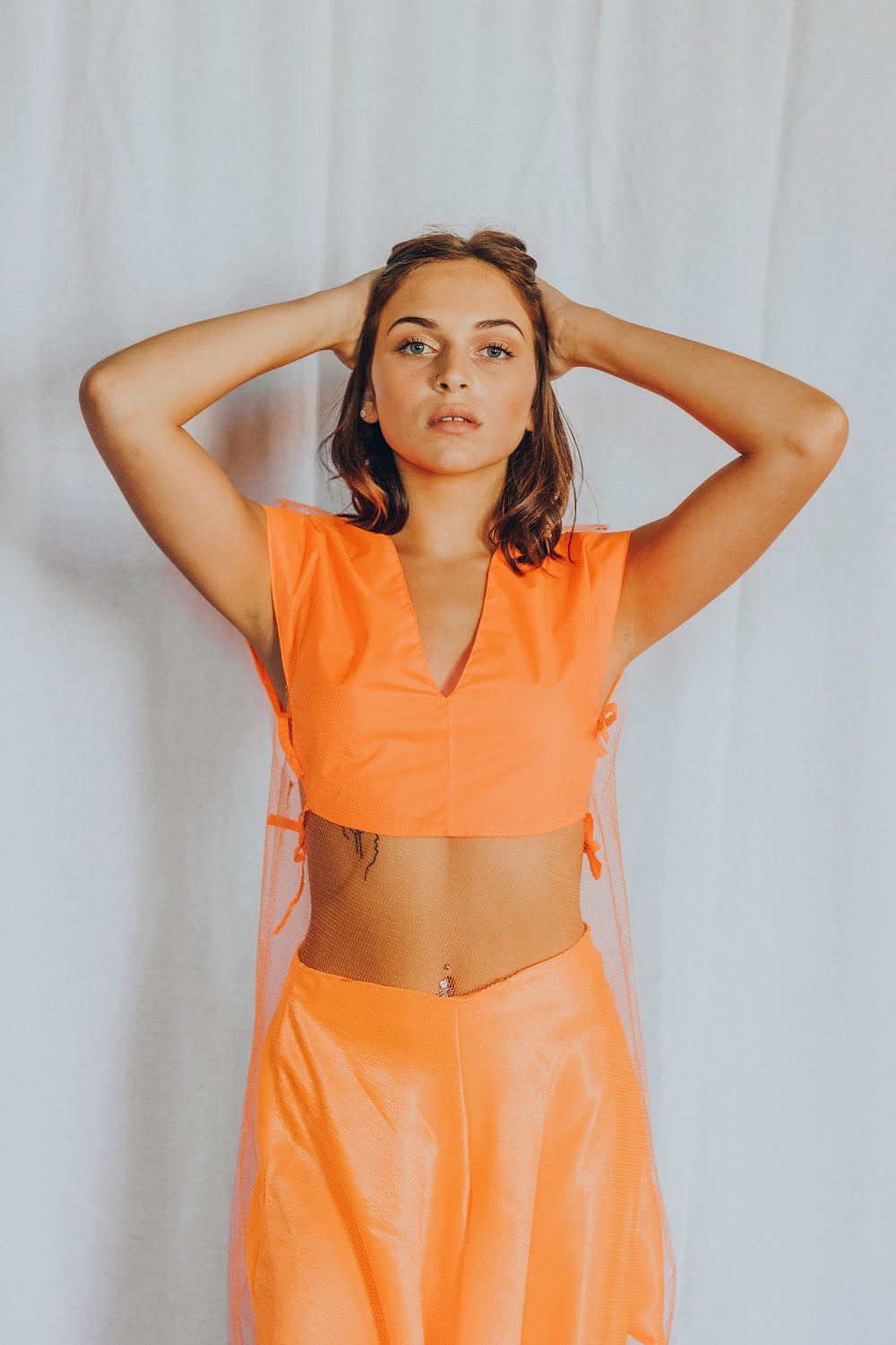 Neon Orange Vinyl V neck crop top